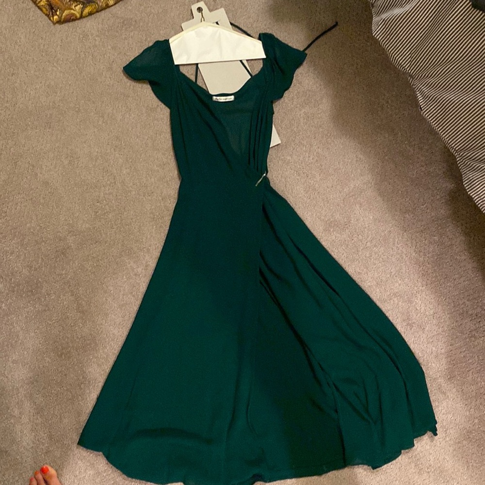 Reformation piper dress in emerald green. Worn twice